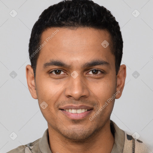 Joyful latino young-adult male with short  brown hair and brown eyes