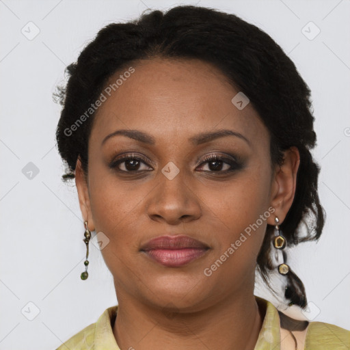 Joyful black young-adult female with medium  brown hair and brown eyes