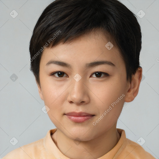 Joyful asian young-adult female with short  brown hair and brown eyes