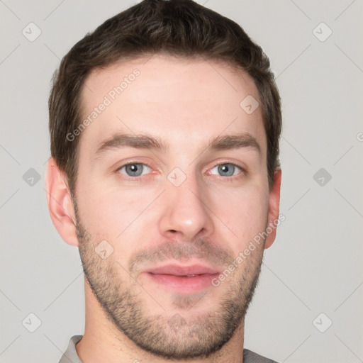 Neutral white young-adult male with short  brown hair and grey eyes