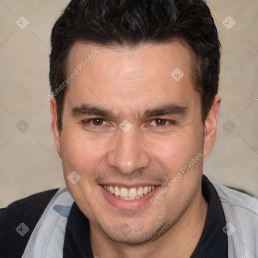 Joyful white adult male with short  brown hair and brown eyes