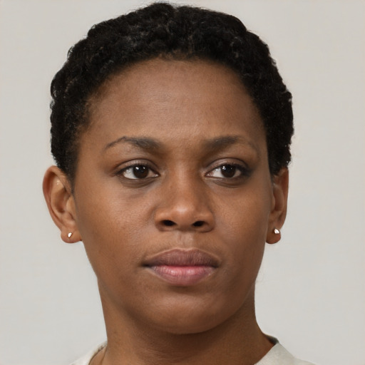 Neutral black young-adult female with short  brown hair and brown eyes