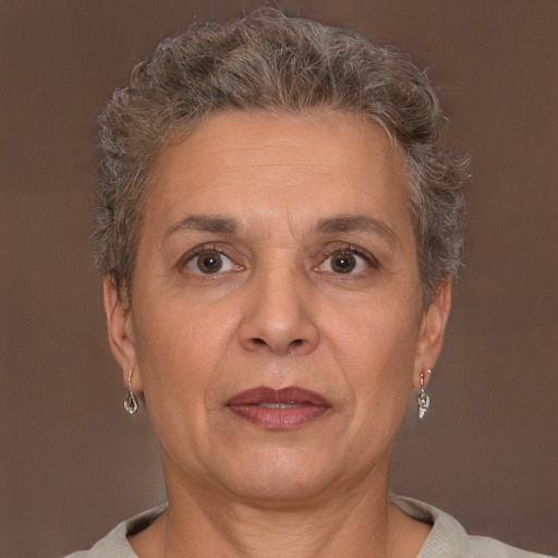 Neutral white middle-aged female with short  brown hair and brown eyes