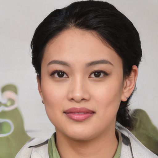 Joyful white young-adult female with medium  black hair and brown eyes