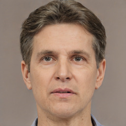 Neutral white adult male with short  brown hair and brown eyes