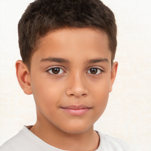 Joyful white child male with short  brown hair and brown eyes