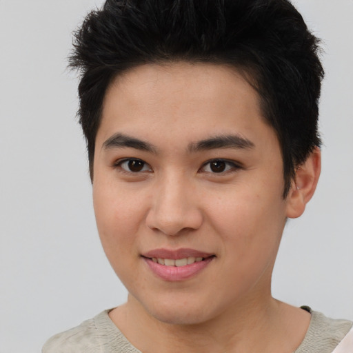 Joyful asian young-adult female with short  brown hair and brown eyes