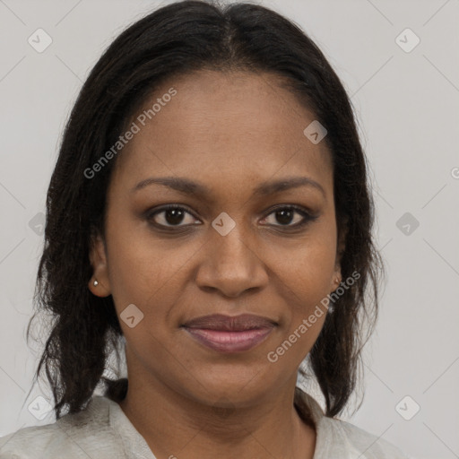 Joyful black young-adult female with medium  brown hair and brown eyes
