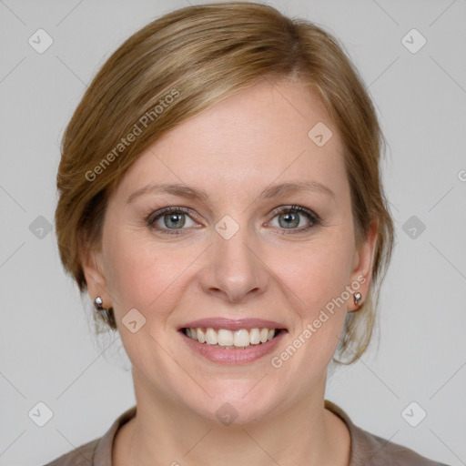 Joyful white young-adult female with medium  brown hair and blue eyes