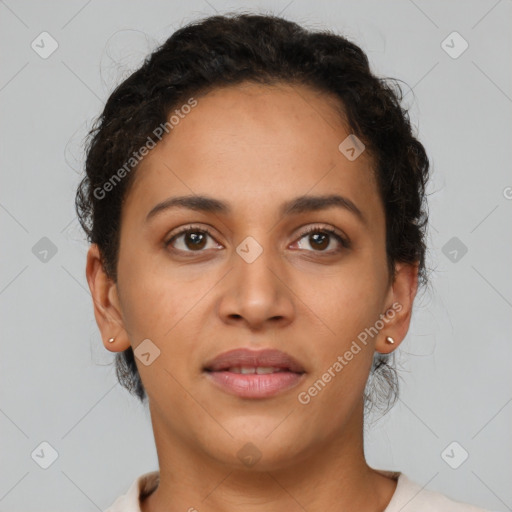 Joyful latino young-adult female with short  brown hair and brown eyes