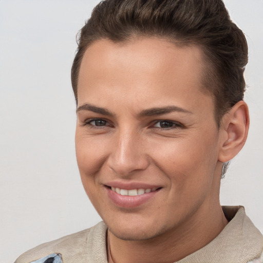 Joyful white young-adult female with short  brown hair and brown eyes