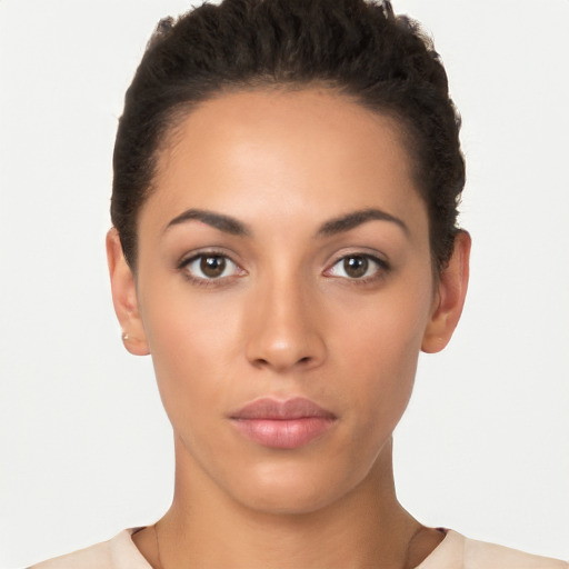 Neutral latino young-adult female with short  brown hair and brown eyes