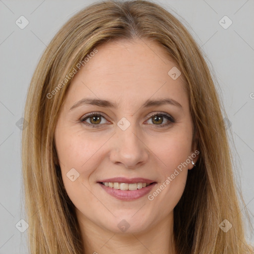 Joyful white young-adult female with long  brown hair and brown eyes