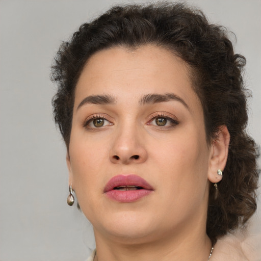 Neutral latino young-adult female with short  brown hair and brown eyes