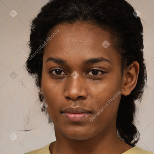 Neutral black young-adult female with short  brown hair and brown eyes