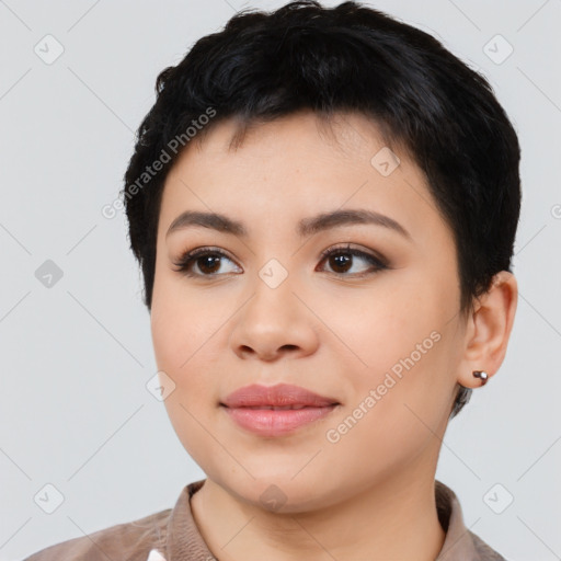 Joyful asian young-adult female with short  black hair and brown eyes