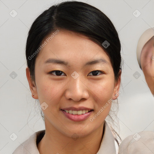 Joyful asian young-adult female with medium  brown hair and brown eyes