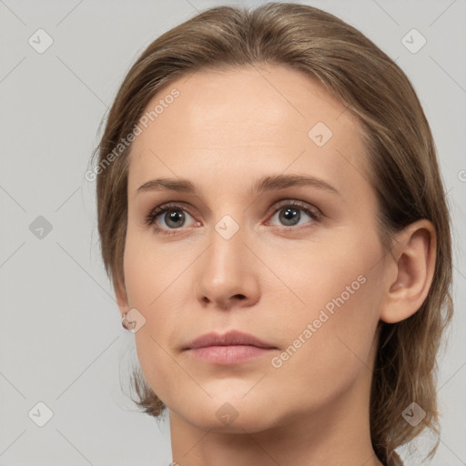 Neutral white young-adult female with medium  brown hair and grey eyes