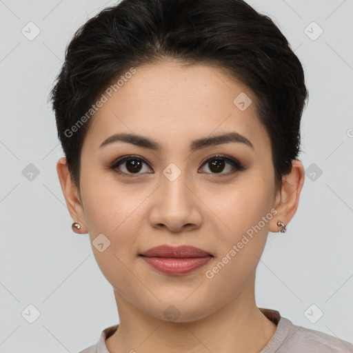 Joyful asian young-adult female with short  brown hair and brown eyes