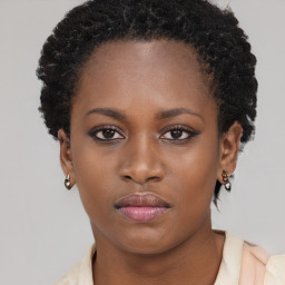 Neutral black young-adult female with short  brown hair and brown eyes