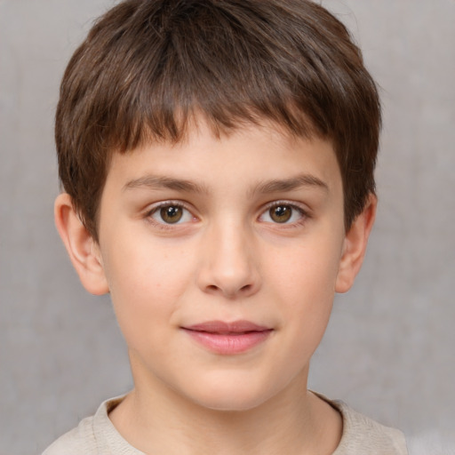 Joyful white child male with short  brown hair and brown eyes