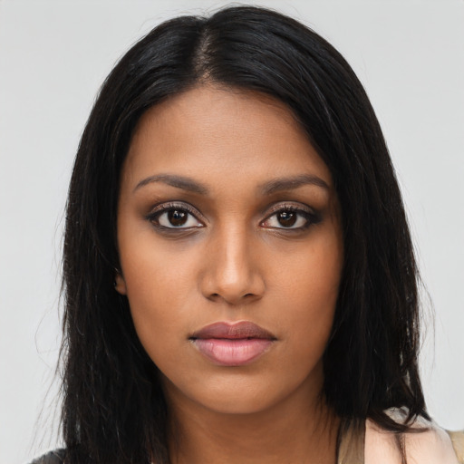 Neutral black young-adult female with long  black hair and brown eyes