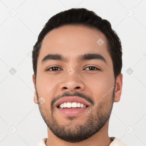 Neutral latino young-adult male with short  black hair and brown eyes