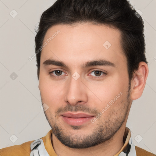 Neutral white young-adult male with short  brown hair and brown eyes