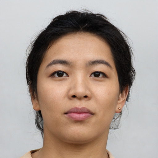 Neutral asian young-adult female with medium  brown hair and brown eyes