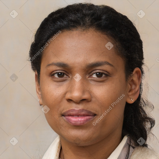 Joyful latino adult female with short  brown hair and brown eyes