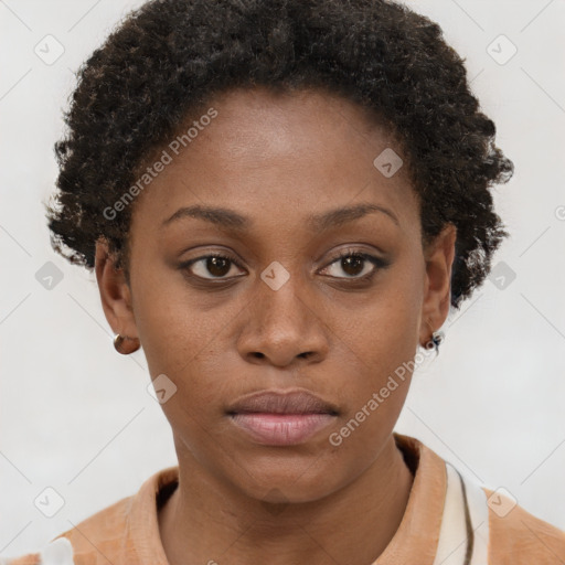 Neutral black young-adult female with short  brown hair and brown eyes