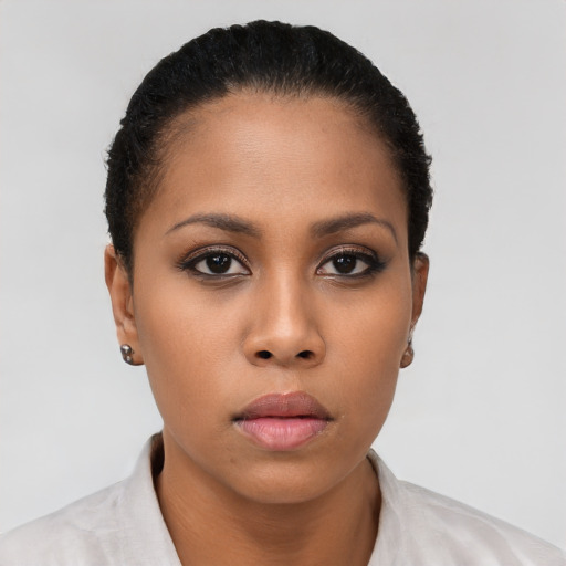 Neutral latino young-adult female with short  black hair and brown eyes
