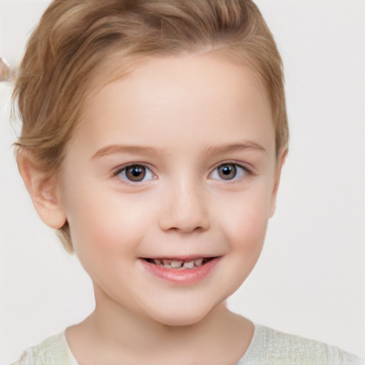 Joyful white child female with short  brown hair and brown eyes