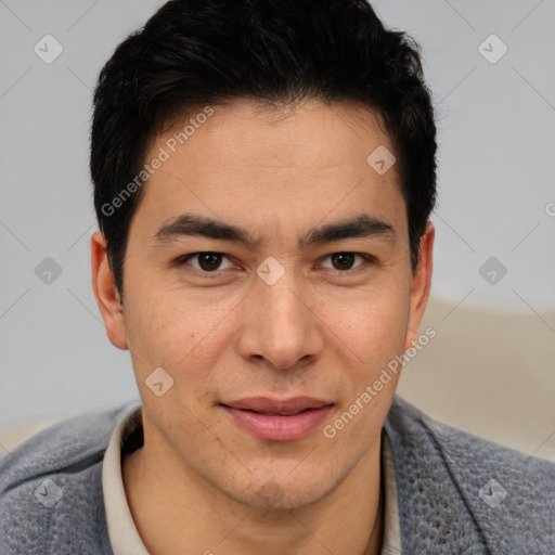 Joyful latino young-adult male with short  brown hair and brown eyes