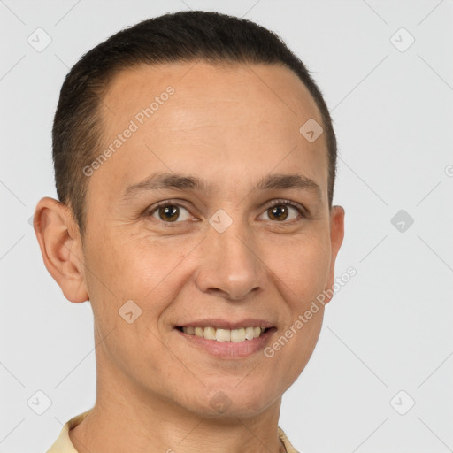 Joyful white adult male with short  brown hair and brown eyes