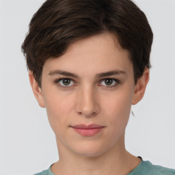 Neutral white young-adult female with short  brown hair and brown eyes