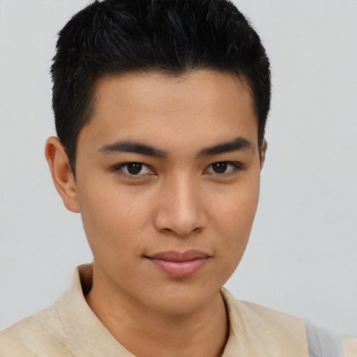 Joyful asian young-adult male with short  brown hair and brown eyes