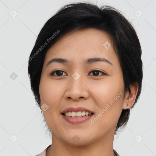 Joyful asian young-adult female with medium  brown hair and brown eyes