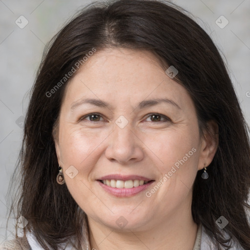 Joyful white adult female with medium  brown hair and brown eyes