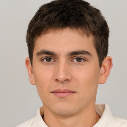 Neutral white young-adult male with short  brown hair and brown eyes