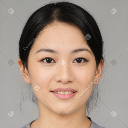 Joyful asian young-adult female with medium  black hair and brown eyes