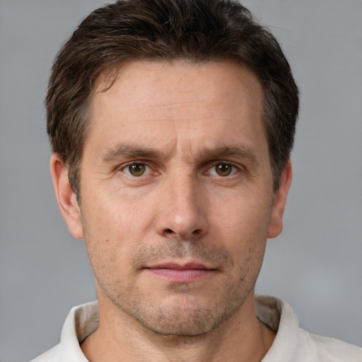 Neutral white adult male with short  brown hair and brown eyes