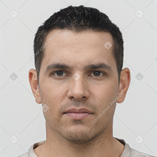Neutral white young-adult male with short  brown hair and brown eyes