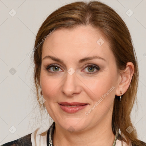 Joyful white young-adult female with medium  brown hair and blue eyes