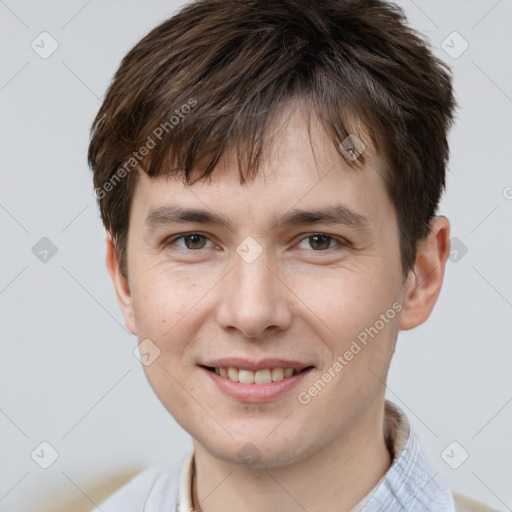 Joyful white young-adult male with short  brown hair and brown eyes