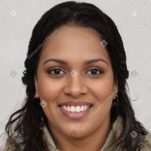 Joyful black young-adult female with long  brown hair and brown eyes