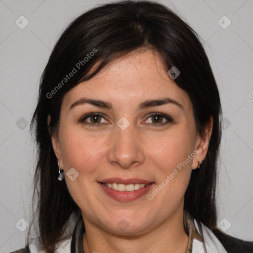 Joyful white adult female with medium  brown hair and brown eyes