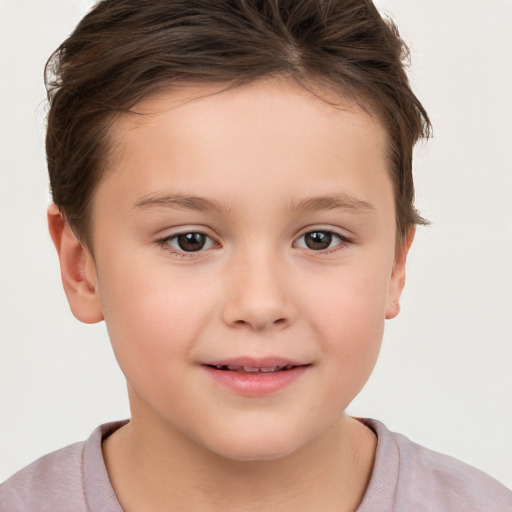 Joyful white child female with short  brown hair and brown eyes