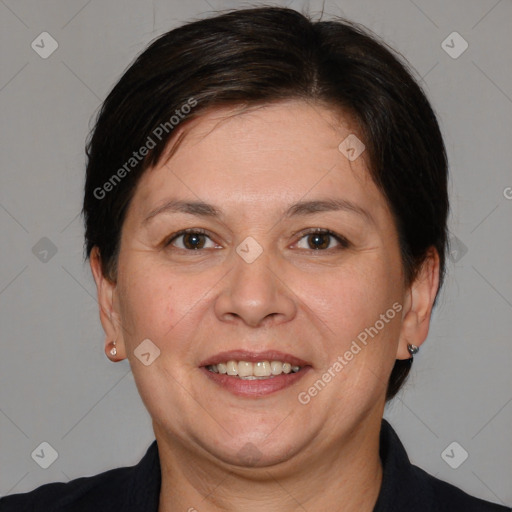 Joyful white adult female with medium  brown hair and brown eyes