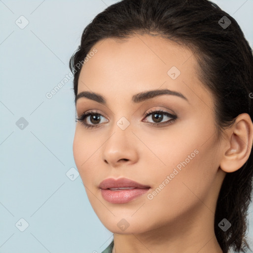 Neutral white young-adult female with long  brown hair and brown eyes